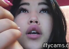 The asian nymphomaniac with the vibrator in the pussy excites