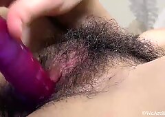 Lovely, young hairy Nina with big tits masturbates