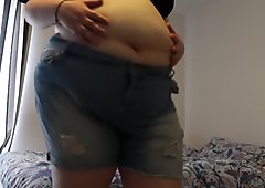 fat belly in tight shorts